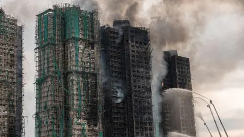 Hong Kong Fire Sparks Outrage as Death Toll Rises