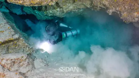 Italian Divers' Fatal Maldives Cave Accident Revealed: Critical Equipment Shortfall Highlighted by Rescuers