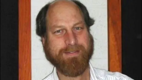 Grieving Families Challenge Conspiracy Theories After Deaths of Scientists