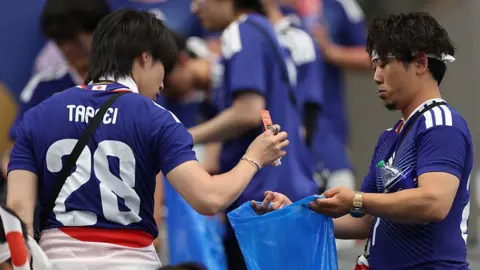 Japanese Fans’ Stadium Clean‑ups Spark Debate on Gender Chores