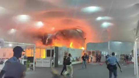 Emergency Evacuation at COP30: Fire Disrupts Key Climate Talks in Brazil