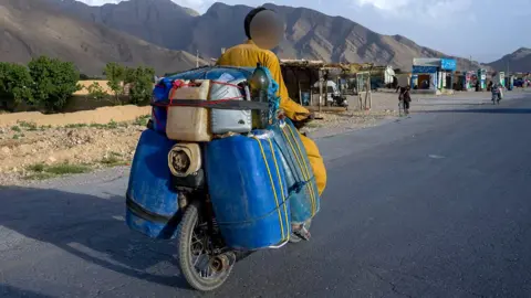 Riders on the Edge: Bikers Transport Iranian Fuel Through Balochistan's Scorching Heat