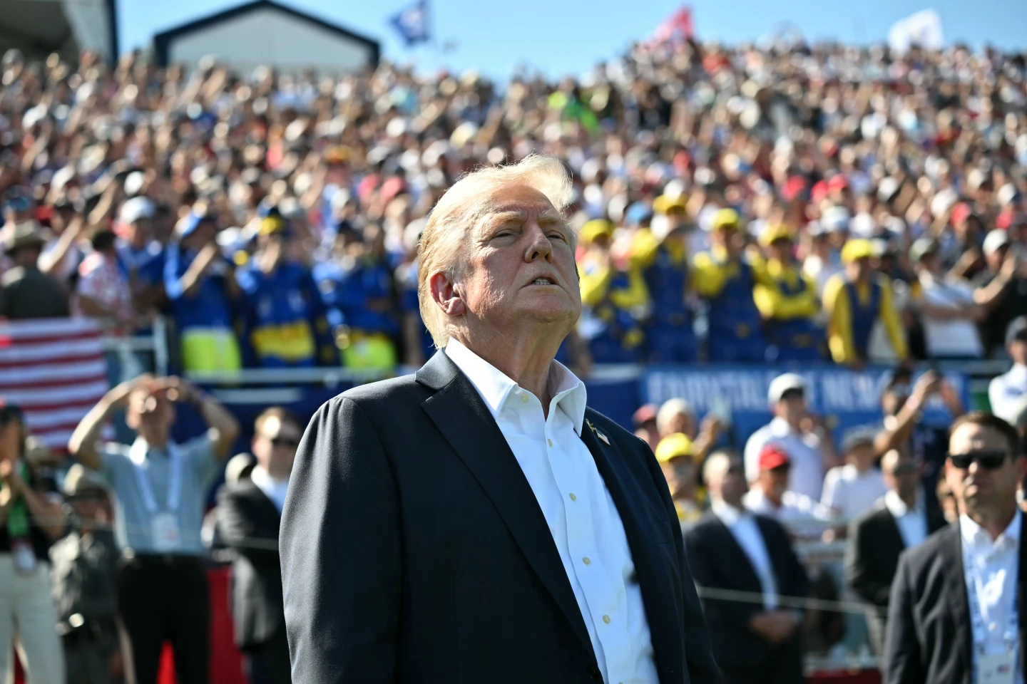 Trump's Sporting Spotlight: Ryder Cup Applause Amid Controversy
