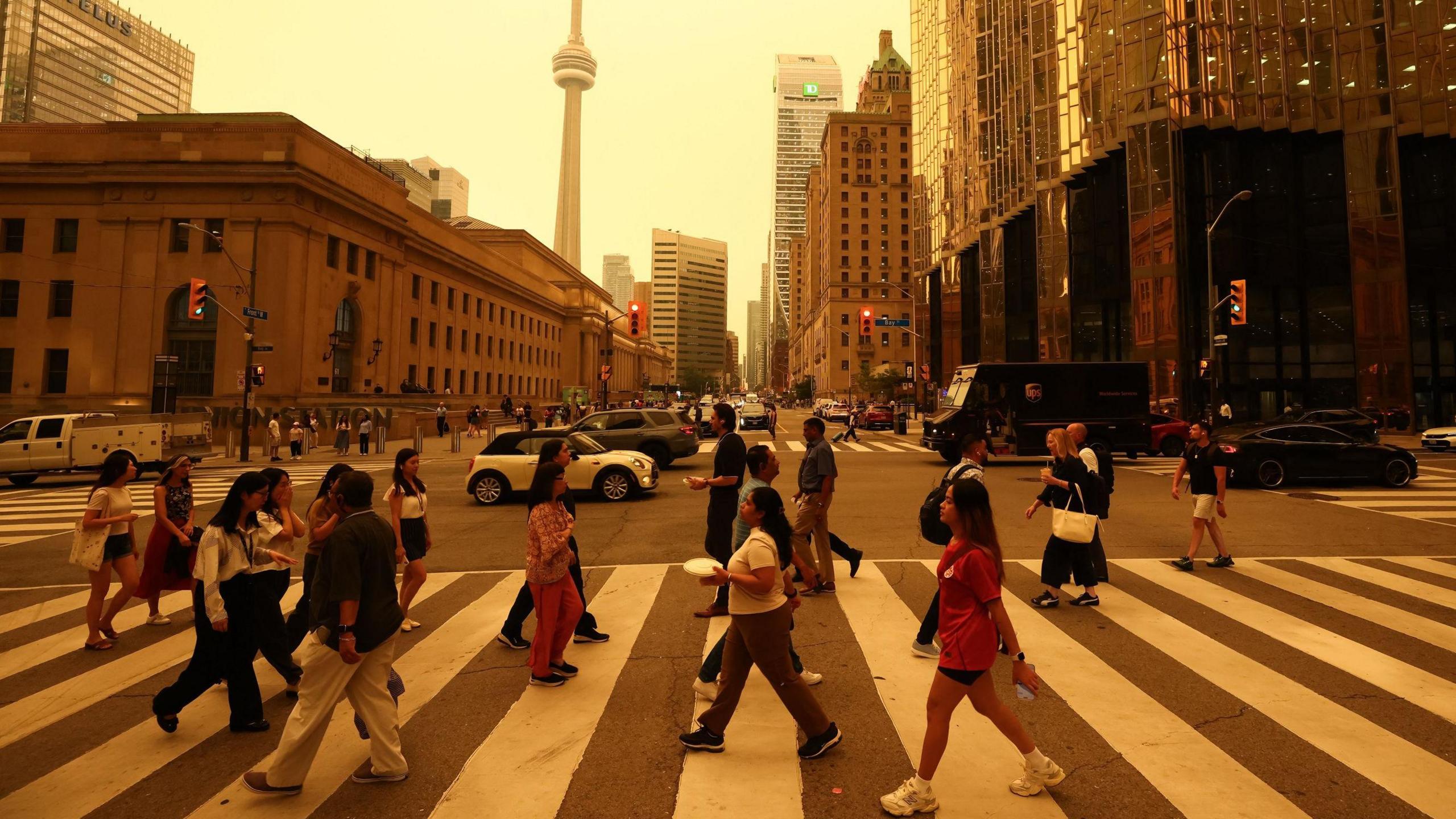 Widespread Wildfires Turn Canada and U.S. Cities Smog‑Adorned