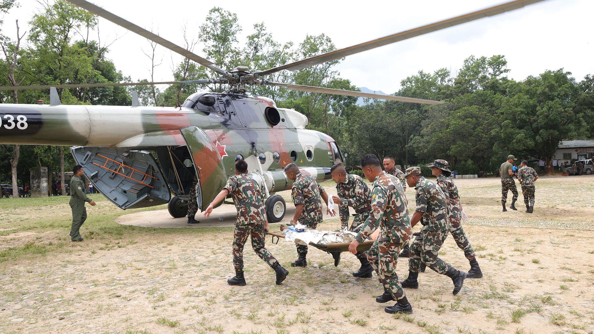 Deadly Nepal‑Tibet Floods: Swaths of Death, International Rescue