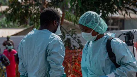 Ebola patient and mother seized after armed men storm DR Congo hospital