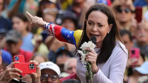 Venezuela Warns Opposition Leader Could Face Arrest Over Nobel Prize