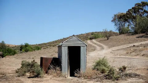 Woman Rescued After Toilet Collapse in Australian Outback